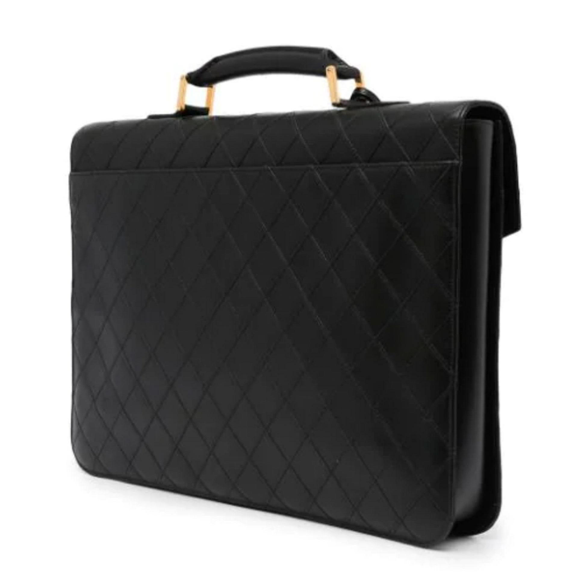 Chanel Vintage Black Diamond Quilted Work Laptop Briefcase Bag 

circa 1992
black
lambskin
diamond quilting
single flat top handle
front flap closure
push-lock fastening
main compartment
internal slip pocket
internal logo stamp
slip pocket to the