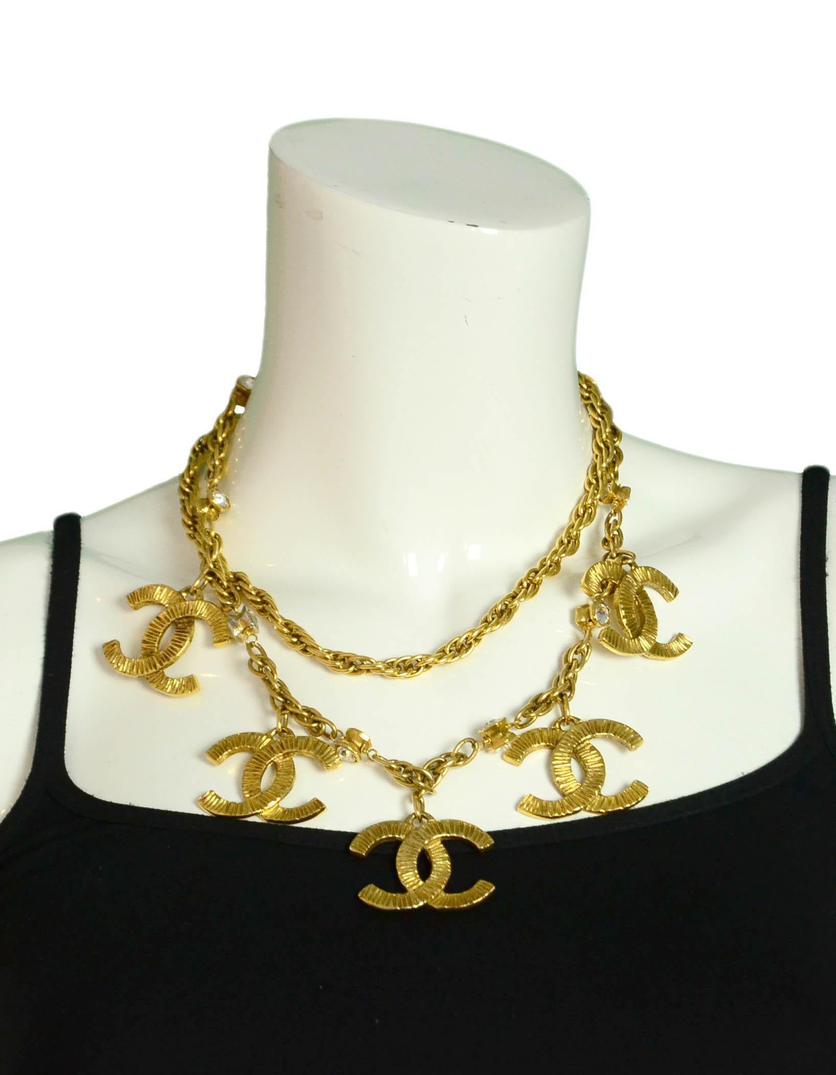 Chanel Vintage Goldtone CC Charm Necklace.Features two goldtone chainlink strands. One of the strands has crystals accents with five textured hanging CC pendants.
Made In: France
Year of Production: Late '80s/early '90s
Color: Goldtone
Materials: