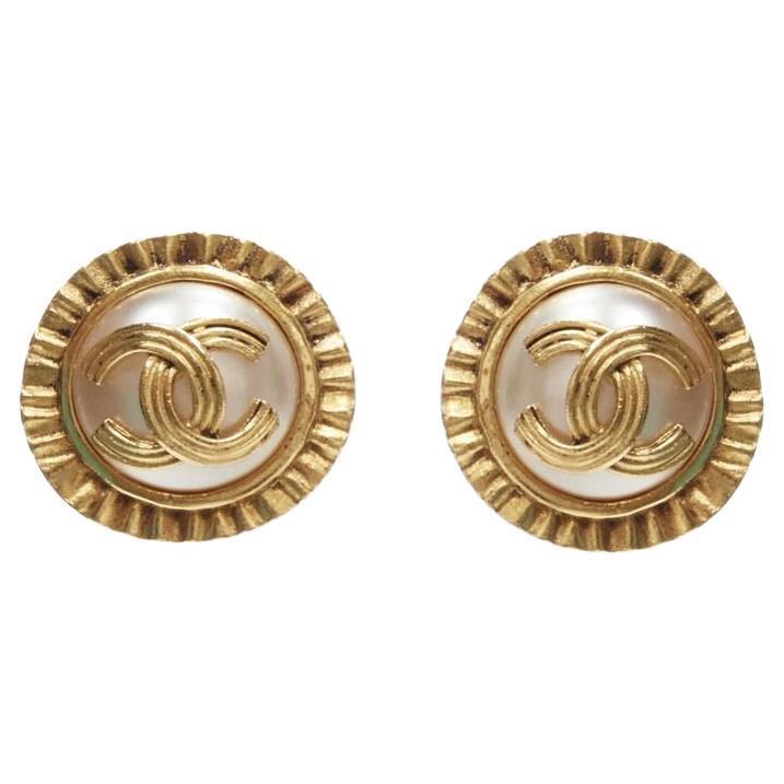 CHANEL Vintage 94A gold tone faux pearl CC logo clip on earring pair For Sale