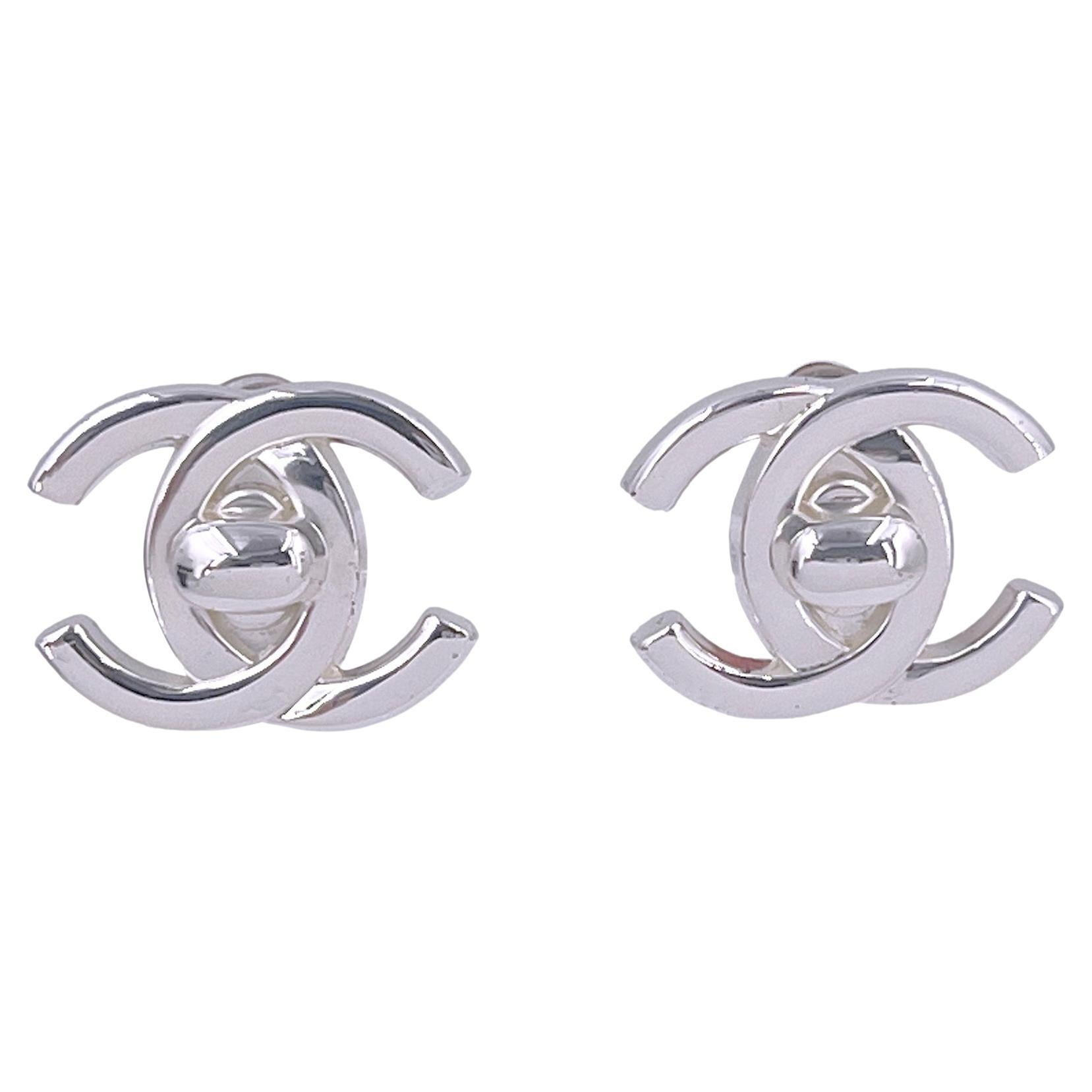 Chanel Vintage 96A Silver Classic Turnlock Stud Earrings 65598 For Sale