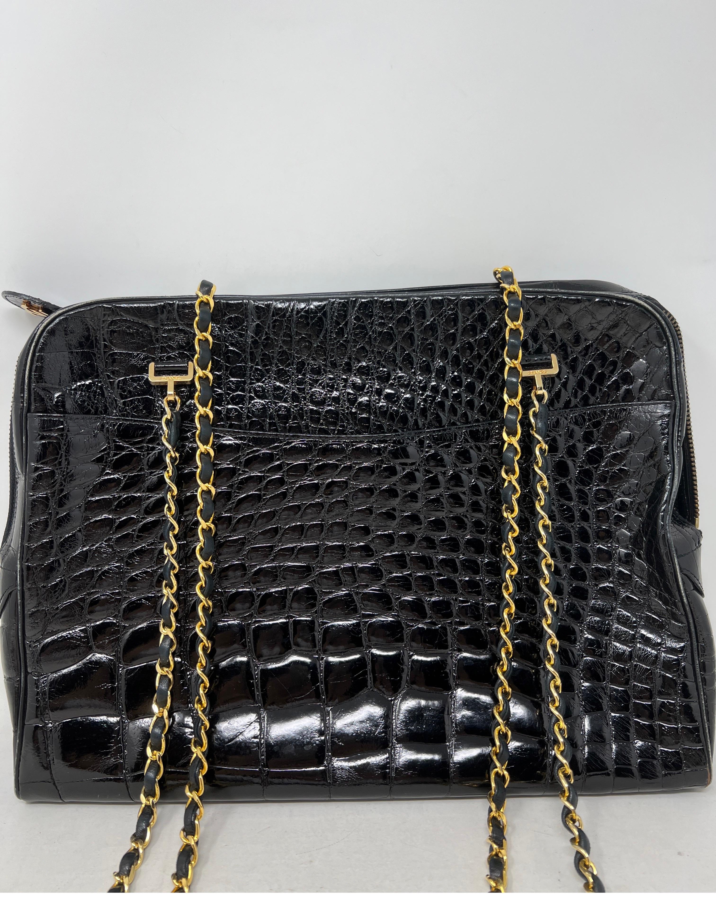 Chanel Black Alligator Bag. 24 karat gold hardware. Beautiful exotic rare shiny alligator with leather interior. Inside clean condition. Light wear on corners. Please see all photos. Chanel does not make any exotic bags anymore. Collector's piece.