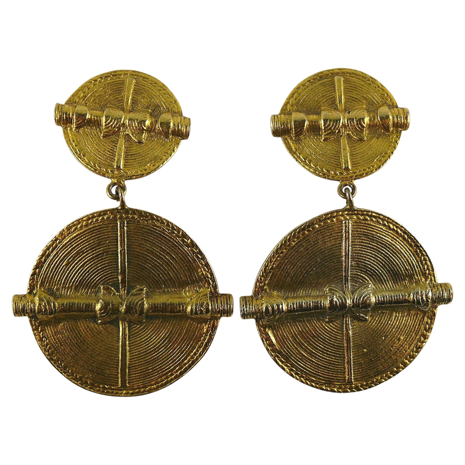 Chanel Vintage Antiqued Gold Toned African Inspired Shields Dangling Earrings
