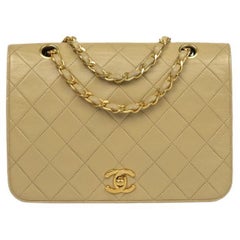 CHANEL, Vintage bag in beige leather