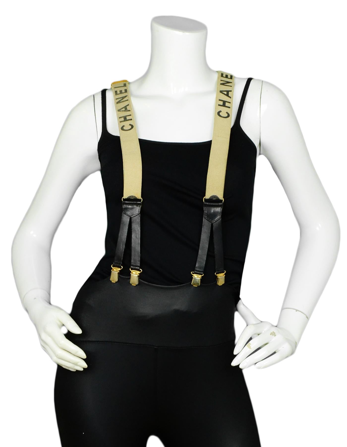 Chanel Vintage Beige & Black Logo Suspenders

Made In: France
Color: Beige, Black
Hardware: Goldtone
Materials: Textile blend, leather
Closure/Opening: Six Suspender Clips
Overall Condition: Fair vintage condition, small scratches on the leather,