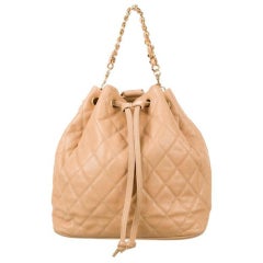Chanel Vintage Beige Quilted Caviar Leather Drawstring Backpack Bag