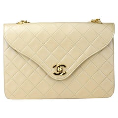Borsa Chanel vintage in pelle d'agnello beige con patta singola