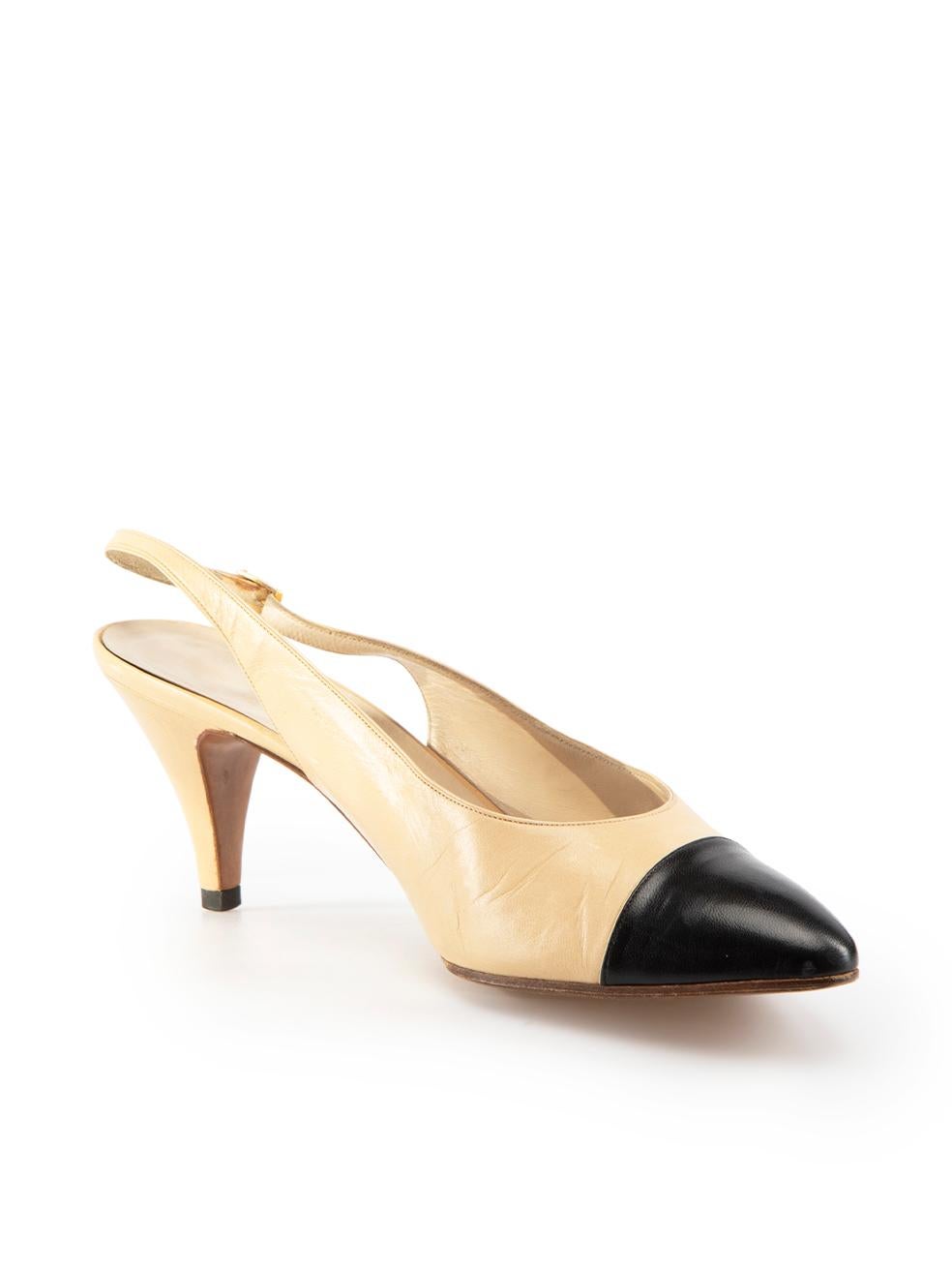 CONDITION is Good. Minor wear to mules is evident. Light indentations to back of heels, minor creasing on toe crease and small scuff marks to toe caps on this used Chanel designer resale item.
 
Details
Vintage
Beige
Leather
Heels
Black leather cap