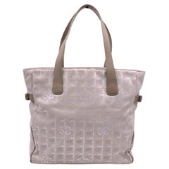 Chanel - Grand sac fourre-tout en toile de nylon beige, ligne de voyage, état neuf