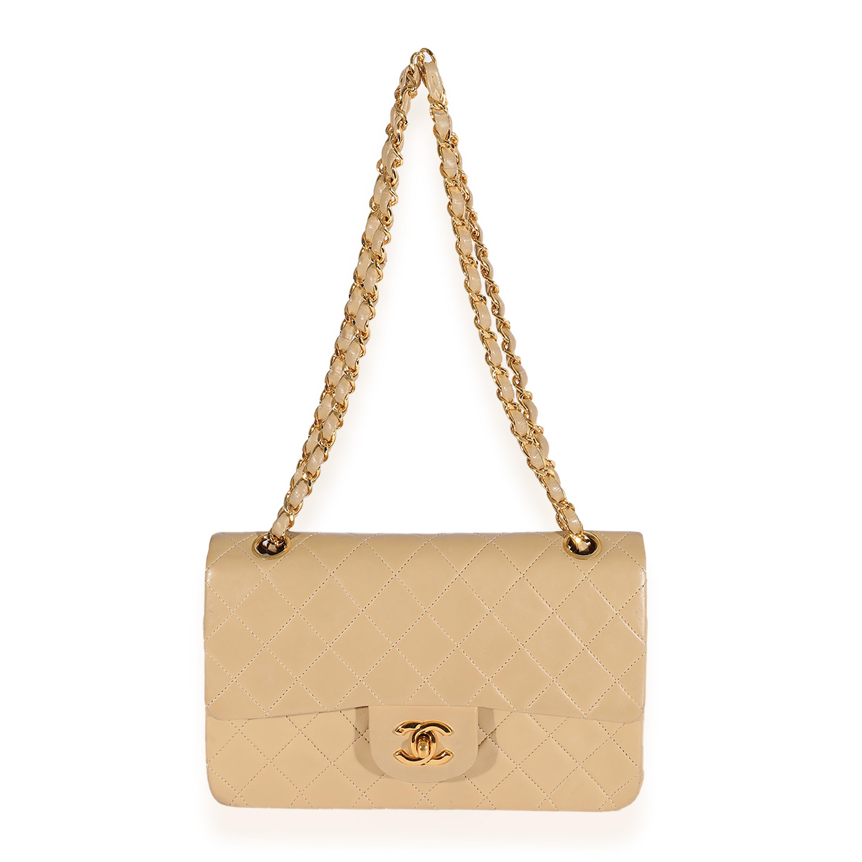 Listing Title: Chanel Vintage Beige Quilted Lambskin Small Classic Double Flap Bag
SKU: 125024
Condition: Pre-owned 
Handbag Condition: Fair
Condition Comments: Fair Condition. Scuffing to corners and exterior. Discoloration and press marks