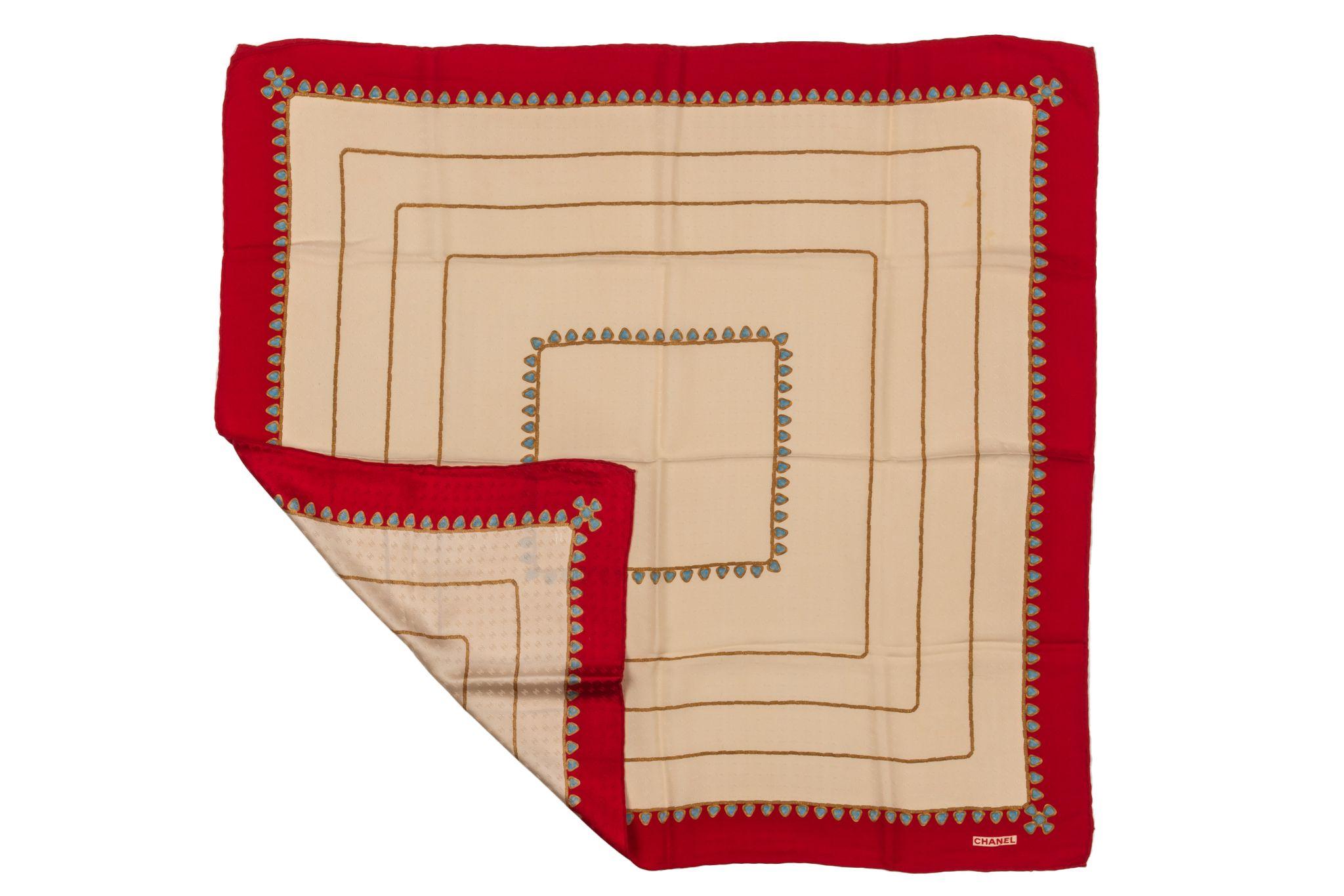 Chanel beige silk geometric squares scarf with a red frame. The piece is in excellent condition and features gripoix jewelry design.