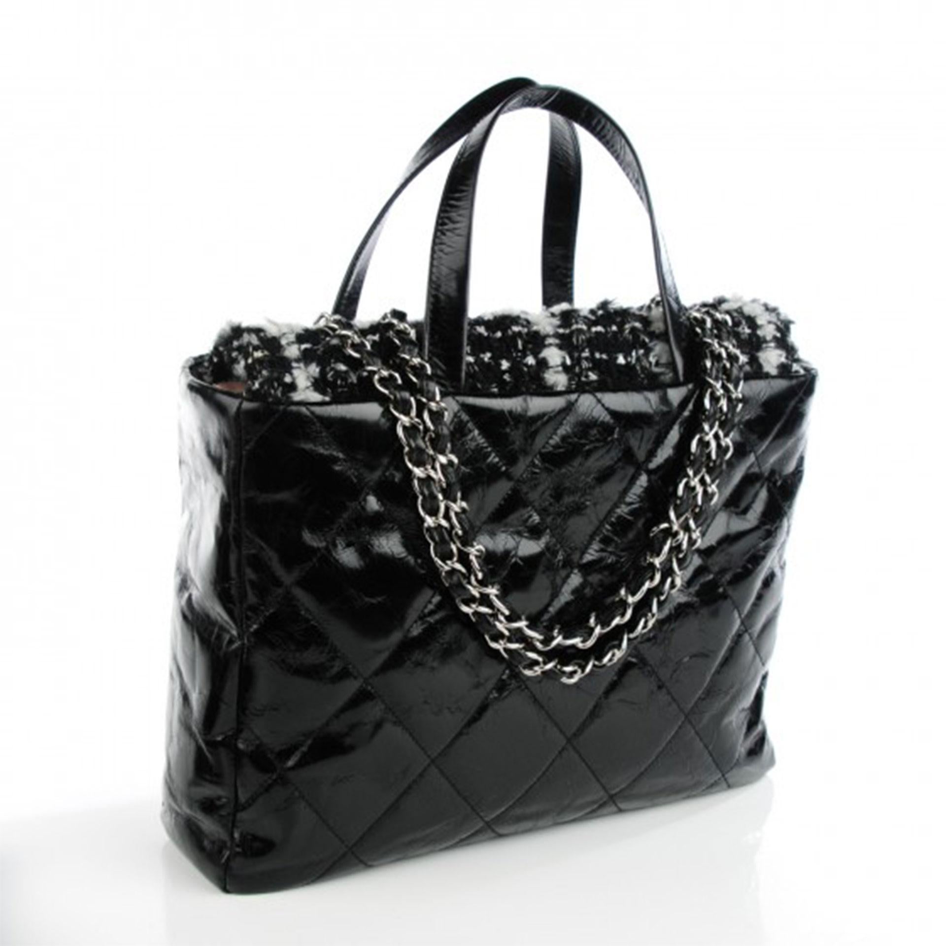 Chanel Limited Edition Soho Glazed Calfskin Quilted Tweed Flight Travel Tote Bag

This is a limited edition bag with 