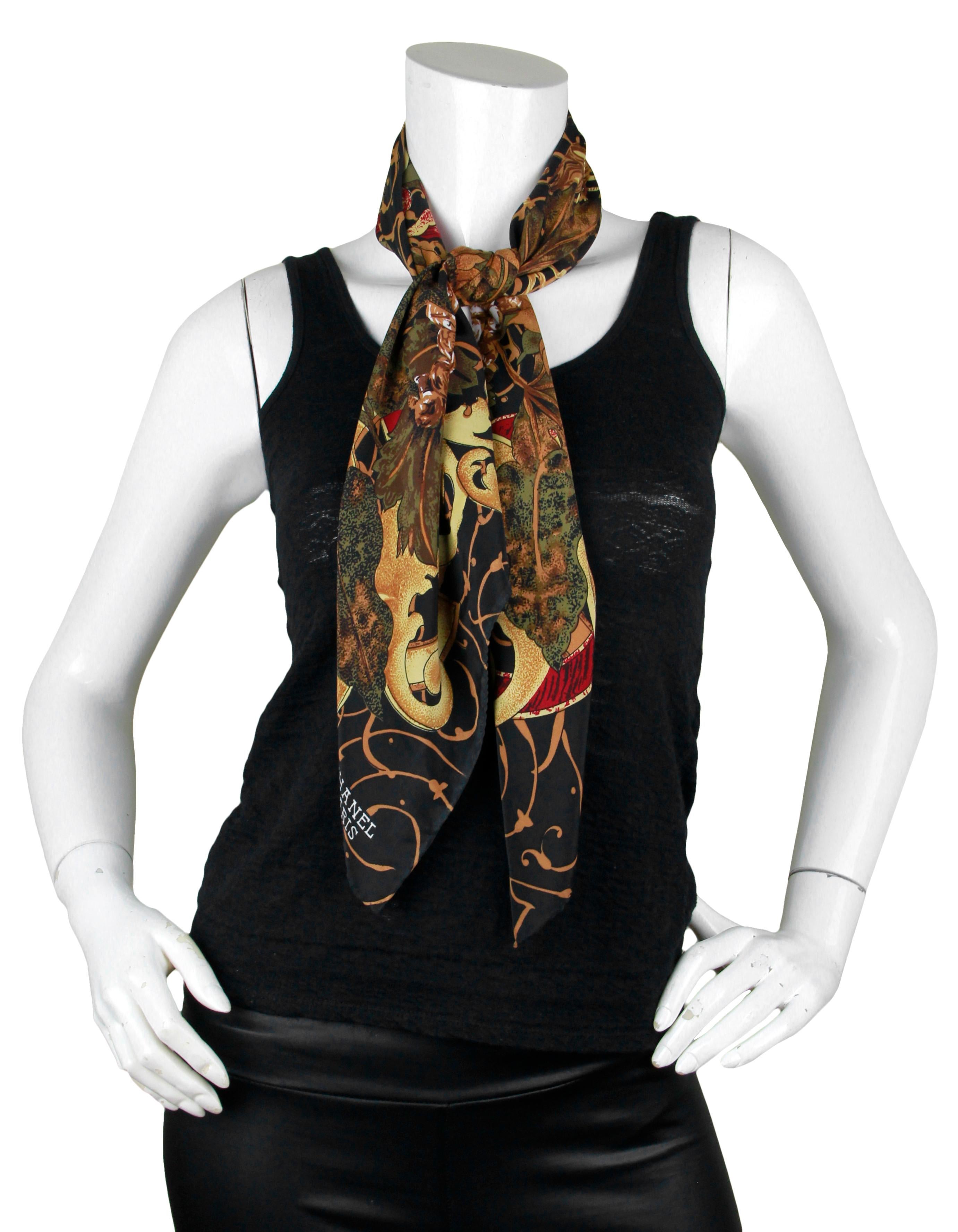 Chanel Vintage Black/Brown Sunflower Print CC 90cm Silk Scarf

Color: Black, brown, beige, burgundy
Materials: Silk
Overall Condition: Excellent pre-owned condition with the exception of missing composition and Chanel tag

Measurements:
35