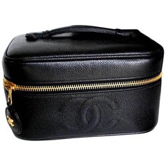 Chanel Vintage black caviar cosmetic toiletry and party vanity bag