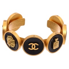 Chanel Vintage Black Gold Round Icon Cuff Bangle Bracelet