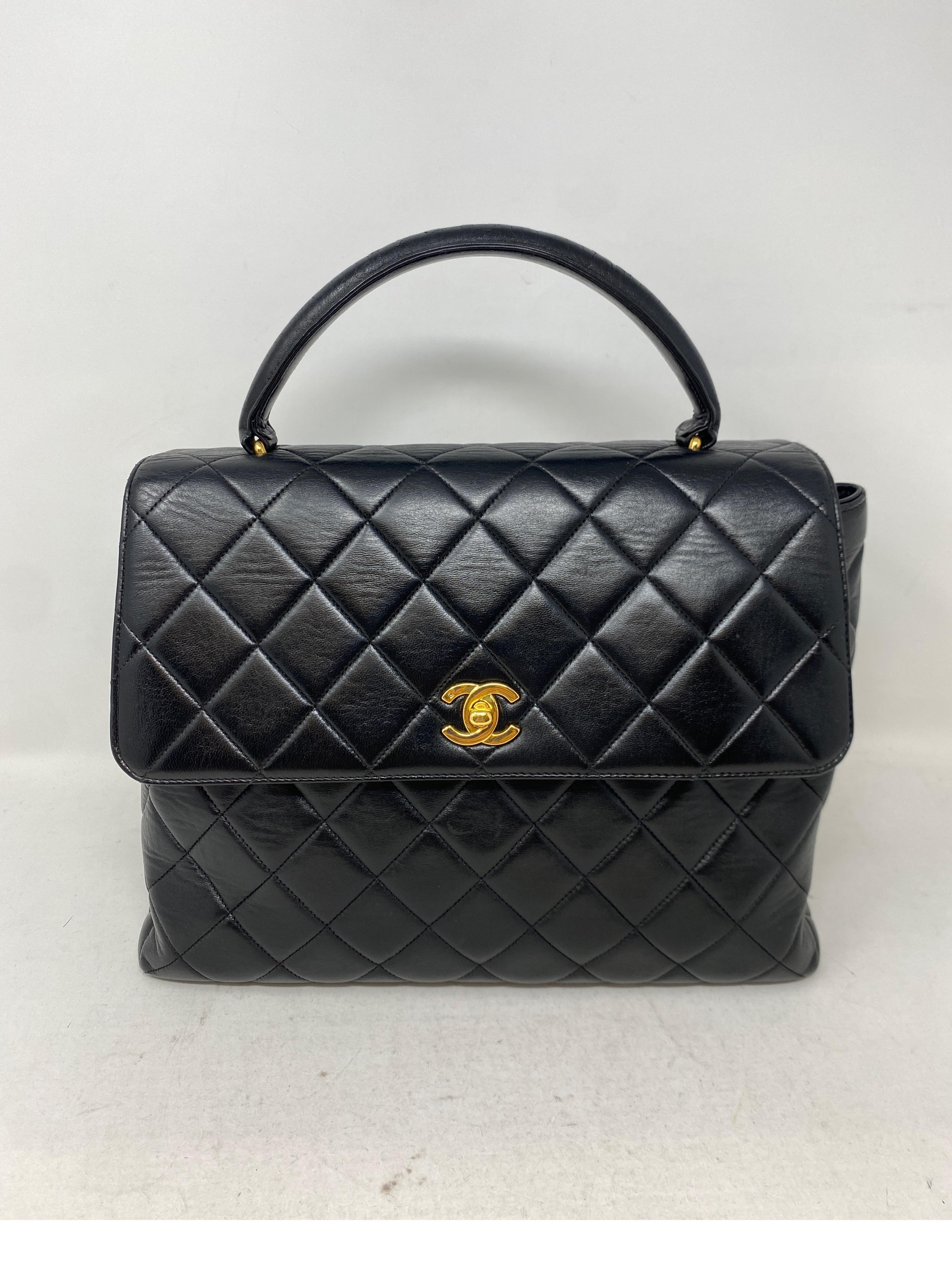 Chanel Black Vintage Kelly Bag. Rare collector's bag. Black lambskin leather. Gold hardware. Good condition. Clean interior. Guaranteed authentic. 