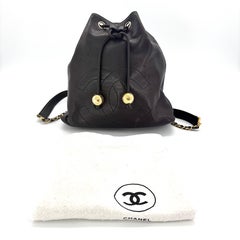 Chanel Vintage Black Lambskin Timeless CC Drawstring Backpack Gold Hardware