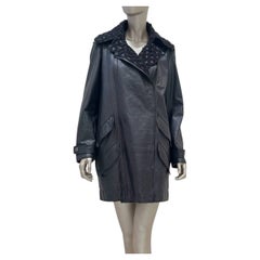 Giacca CHANEL vintage in pelle nera con bordi in bouclé, taglia 42-44