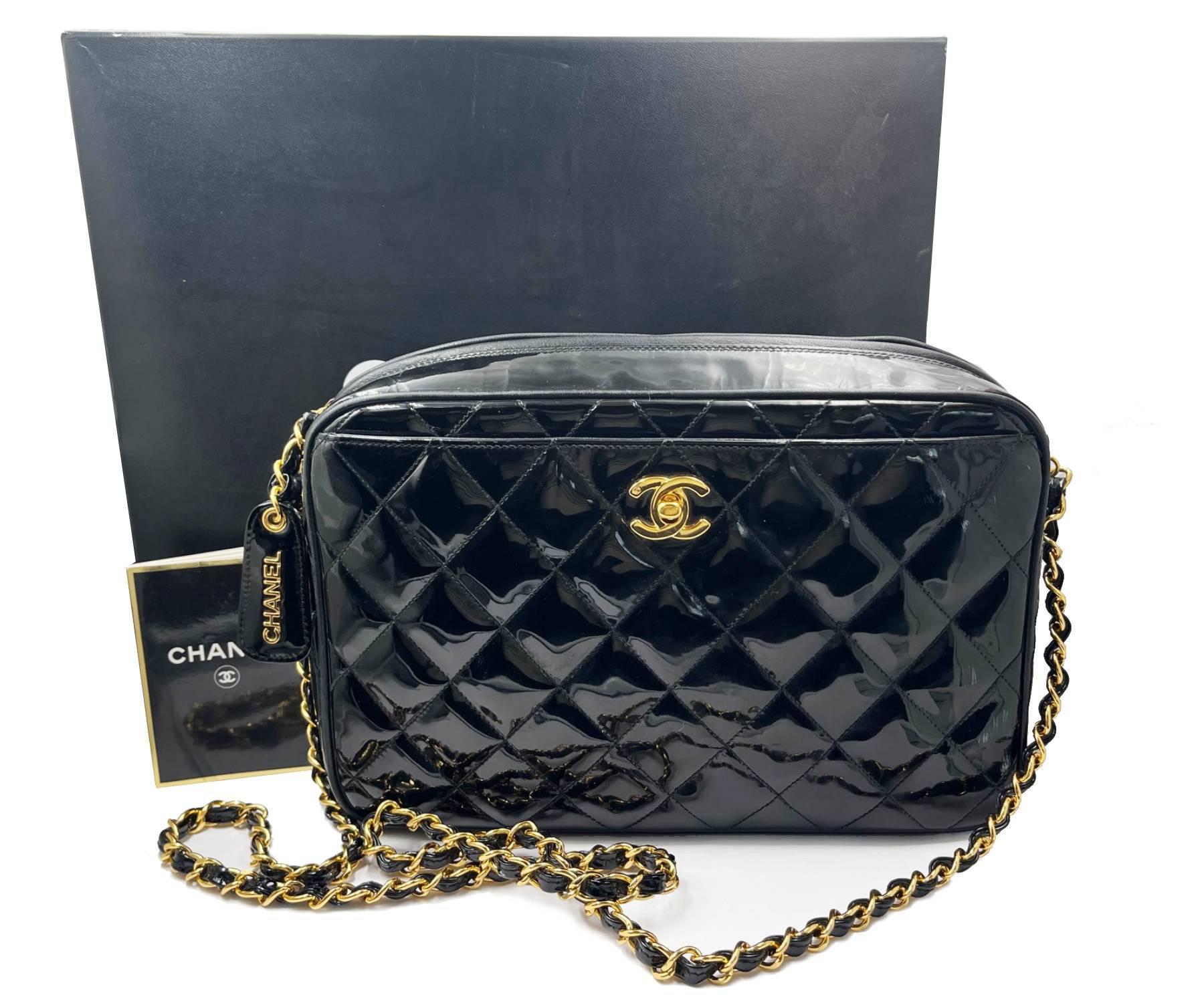 Chanel Vintage Black Patent Leather Large Camera Cross Body Bag

*385 XXXX
*Made in Italy
*Comes with the original box and booklet
*24K gold plated hardware

-It is approximately 10
