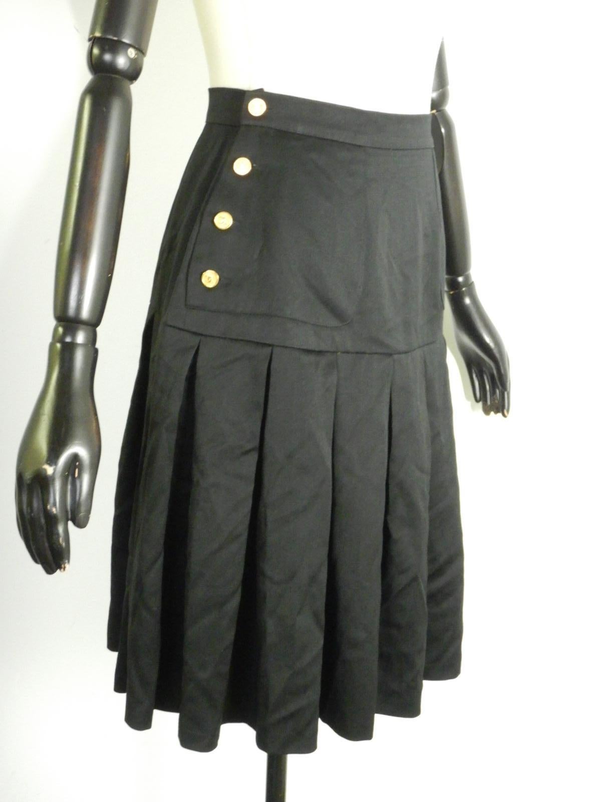 gold and black pleated skirt