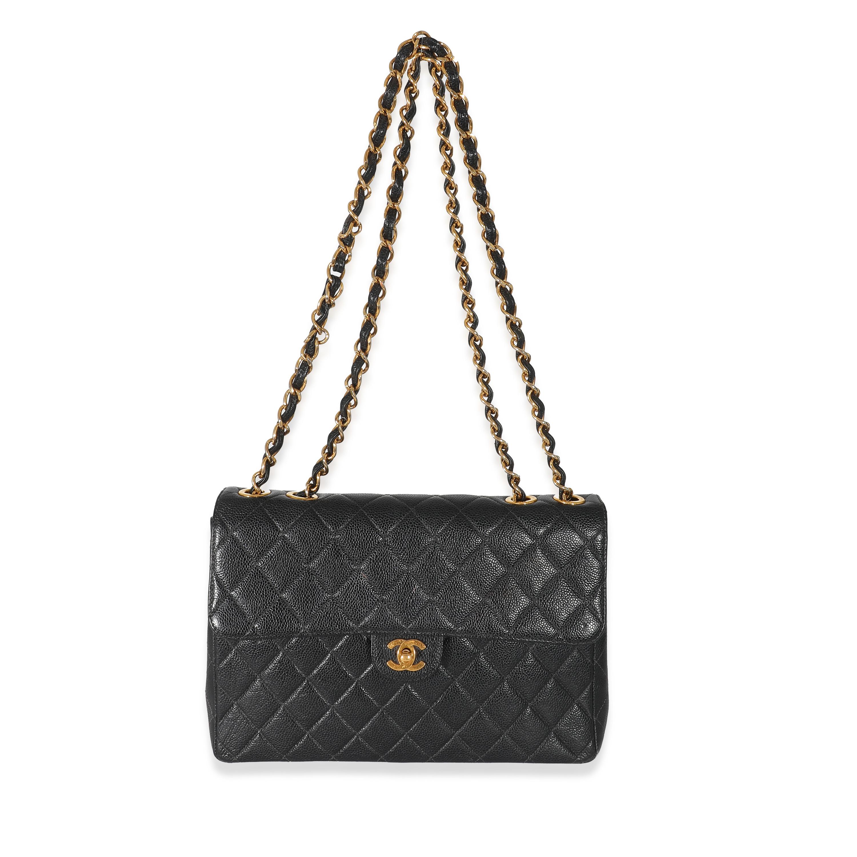 Listing Title: Chanel Vintage Black Quilted Caviar Jumbo Single Flap Bag
SKU: 134006
Condition: Pre-owned 
Handbag Condition: Good
Condition Comments: Item is in good condition with apparent signs of wear. Extensive scuffing, marks, and