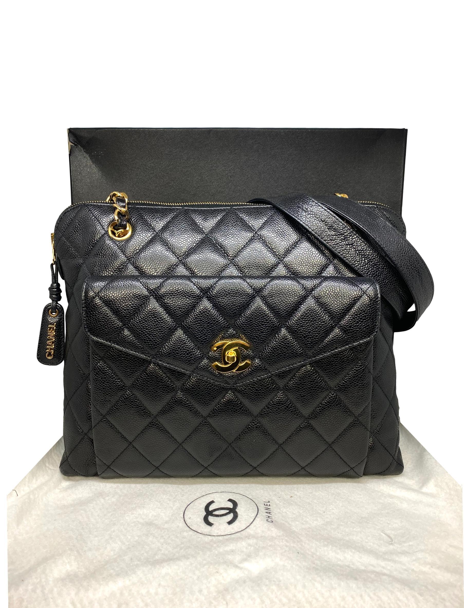 Chanel Vintage Black Quilted Caviar Leather Shoulder Bag with Gold Hardware, 1996 - 1997. Crafted from the classic and Chanel's most durable black caviar leather, this Chanel Logo shoulder bag features a mademoiselle chain toggle and front pocket