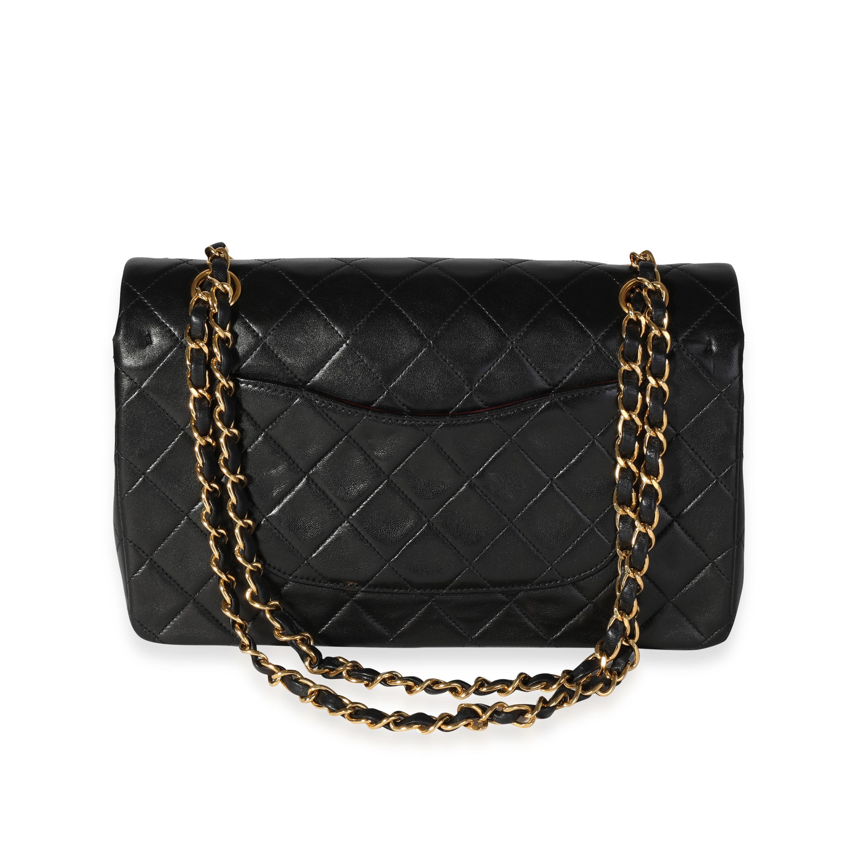 Listing Title: Chanel Vintage Black Quilted Lambskin Classic Medium Double Flap
SKU: 118164
MSRP: 8800.00
Condition: Pre-owned (3000)
Handbag Condition: Very Good
Condition Comments: scratches on interior. Minor wear to corners.
Brand: Chanel
Origin