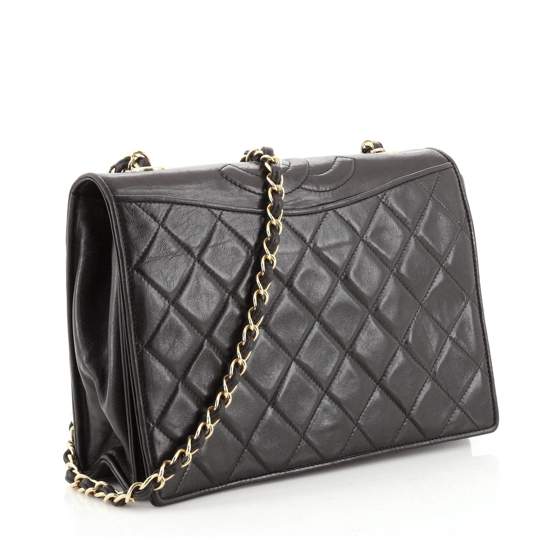 Chanel Vintage Black Quilted Lambskin Leather CC Full Medium Flap Bag

Condition Details: Odor in interior. Creasing, moderate wear, scuffs and indentations on exterior and underneath flap, heavy wear on exterior and flap edges, moderate wear on