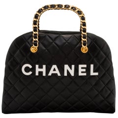 Chanel Vintage Schwarze Medium Bowlingtasche aus gestepptem Lammfell und Leder