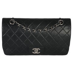 Borsa Chanel Vintage nera trapuntata in pelle d
agnello media classica a doppia patta