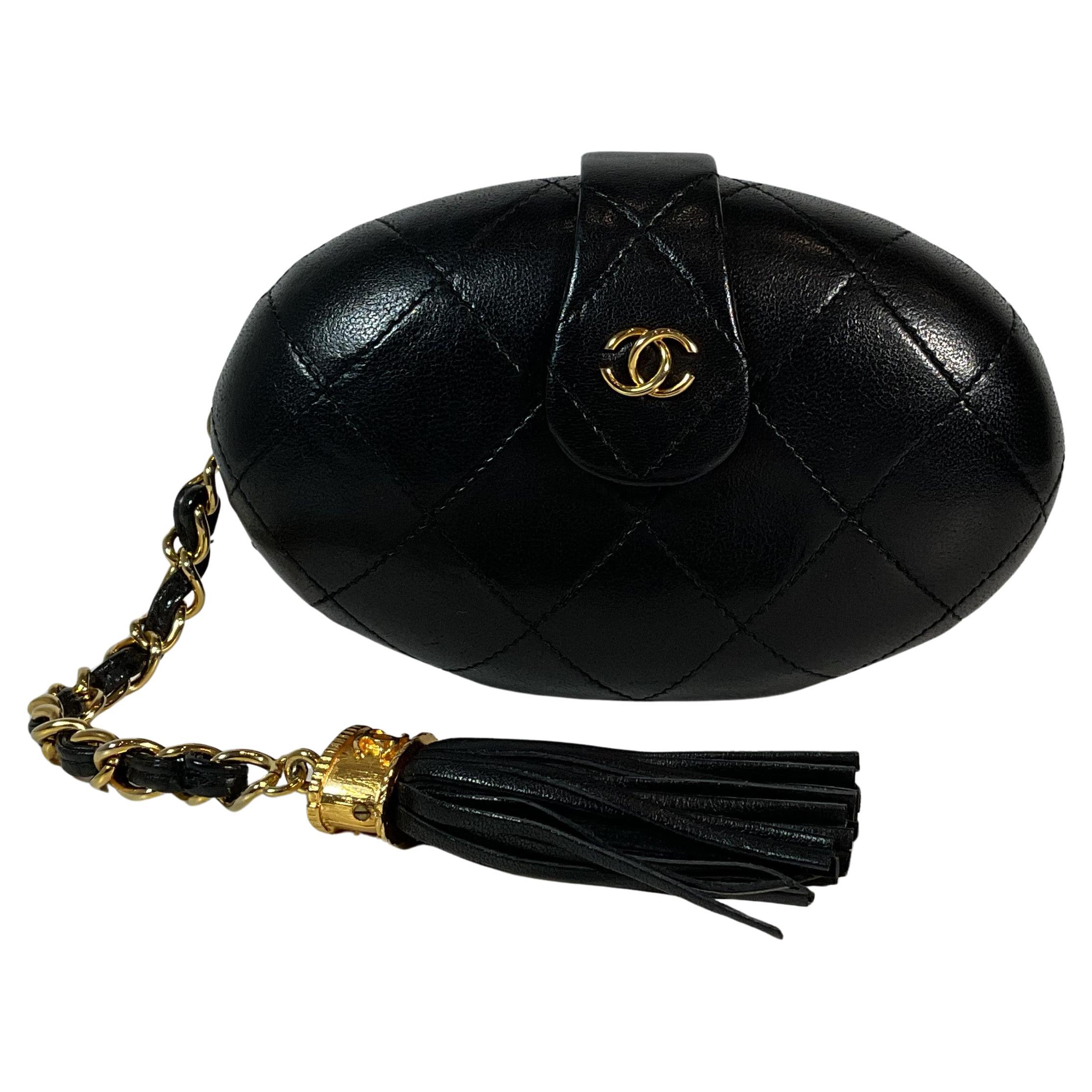 CHANEL Vintage Black Quilted Lambskin Oval Clutch w/ Logo Tassel For Sale