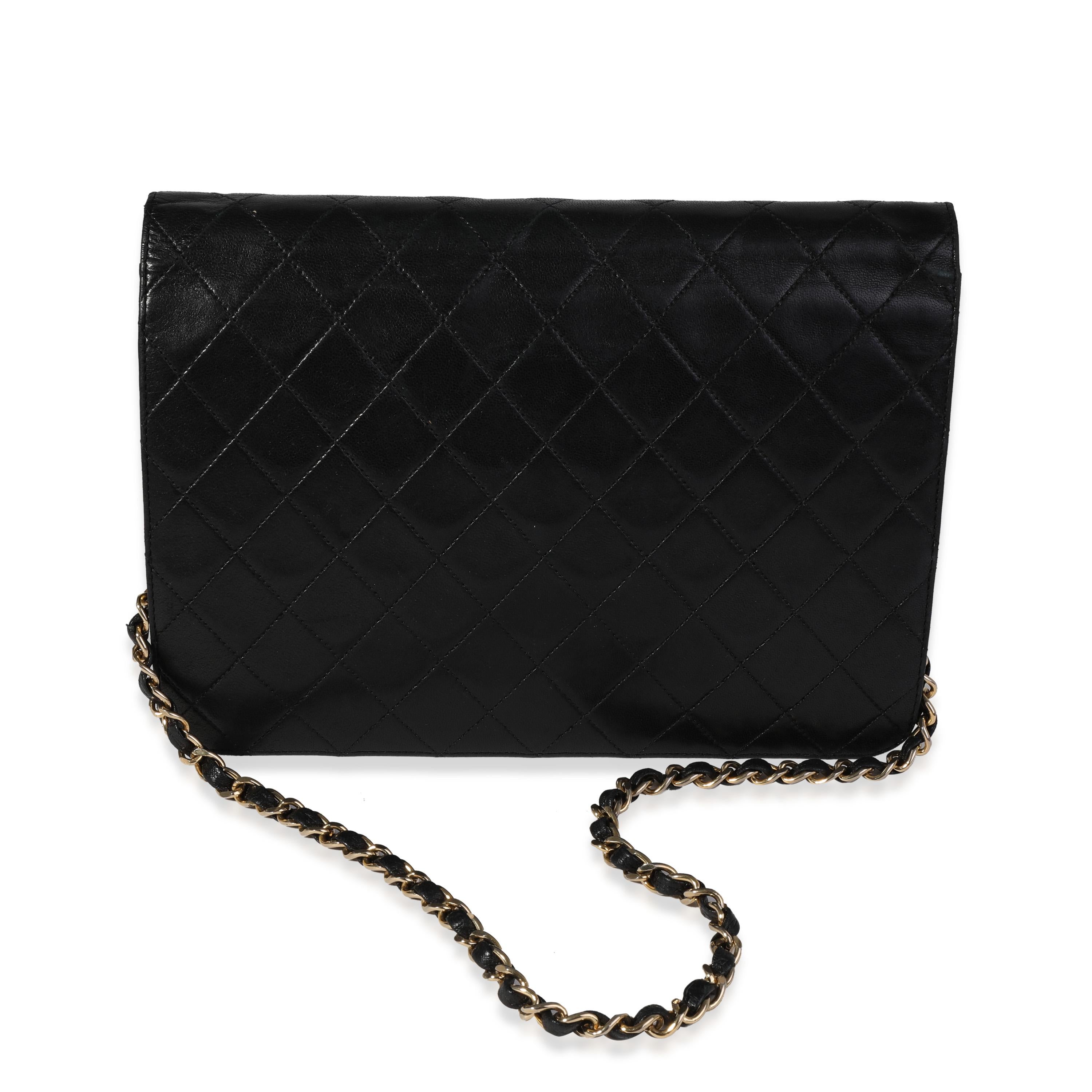 Listing Title: Chanel Vintage Black Quilted Lambskin Single Flap Bag
SKU: 120392
Condition: Pre-owned 
Handbag Condition: Very Good
Condition Comments: Very Good Condition. Fading and scuffing throughout. Scratching and discoloration to hardware.