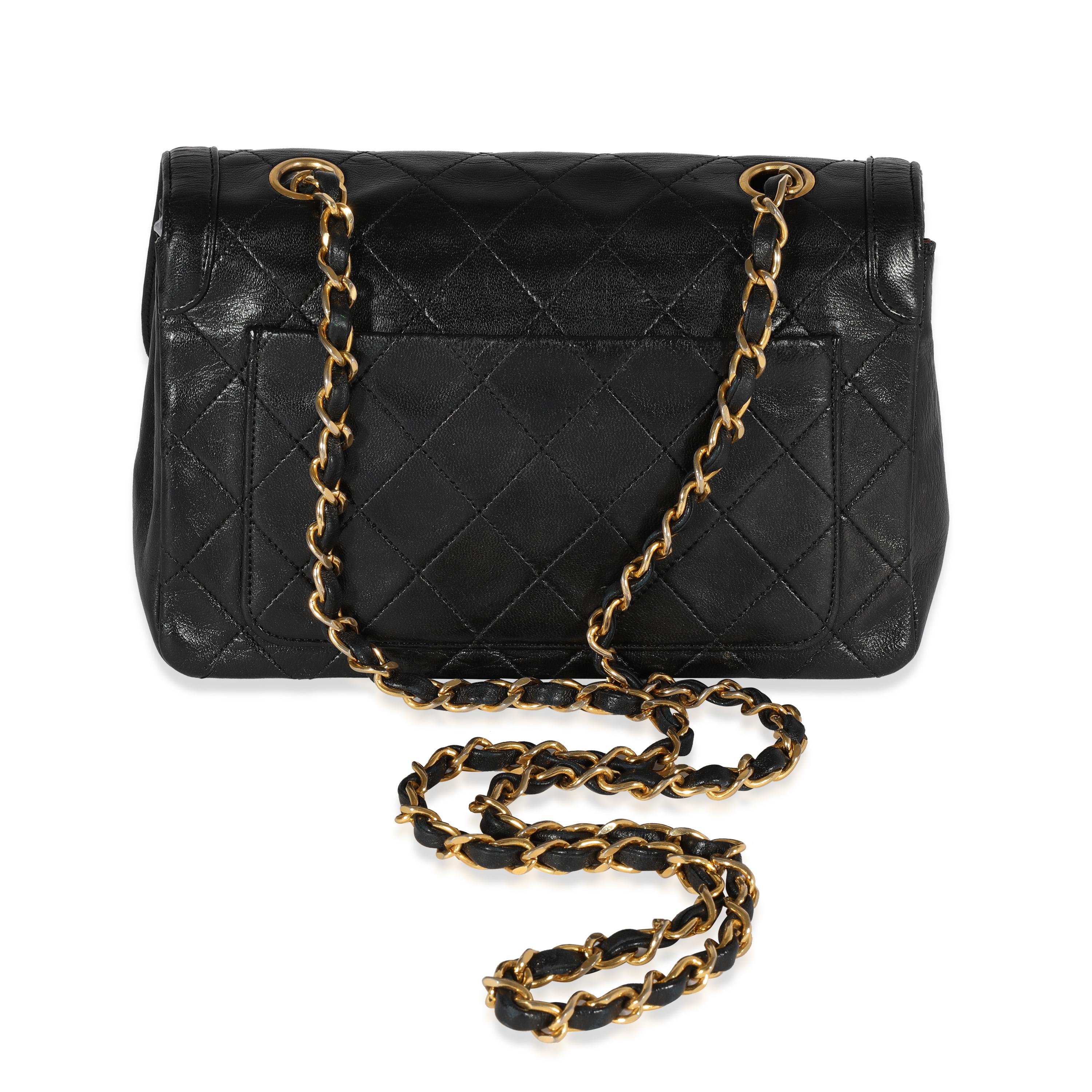 Listing Title: Chanel Vintage Black Quilted Lambskin Single Flap Bag
SKU: 121977
Condition: Pre-owned 
Handbag Condition: Good
Condition Comments: Good Condition. Scuffing to corners and exterior. Creasing and indents to leather. Scratching and