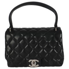 Chanel Vintage - Petit sac Kelly à rabat en cuir d'agneau matelassé noir