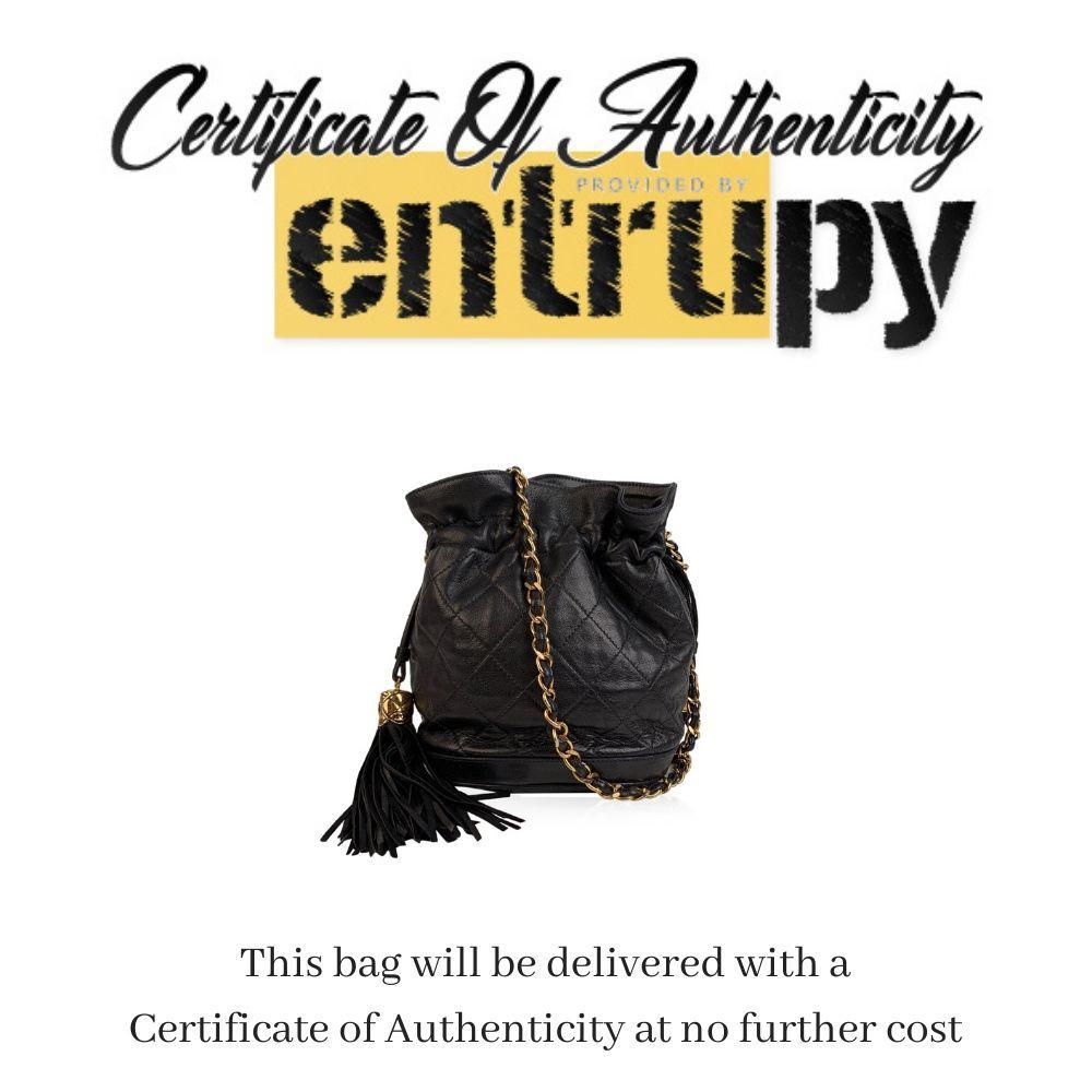 This beautiful Bag will come with a Certificate of Authenticity provided by Entrupy leading International Fashion Authenticators. The certificate will be provided at no further cost. - Beautiful small vintage CHANEL bucket - Made of quilted black