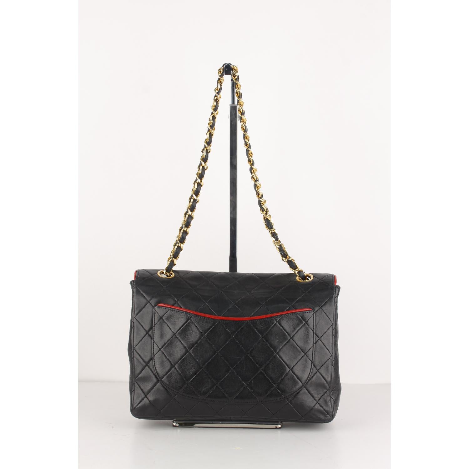 Women's Chanel Vintage Black Quilted Leather Shoulder Bag with Contrast Trim