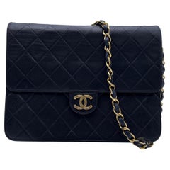 Chanel Vintage Black Quilted Leather Timeless Mini Shoulder Bag