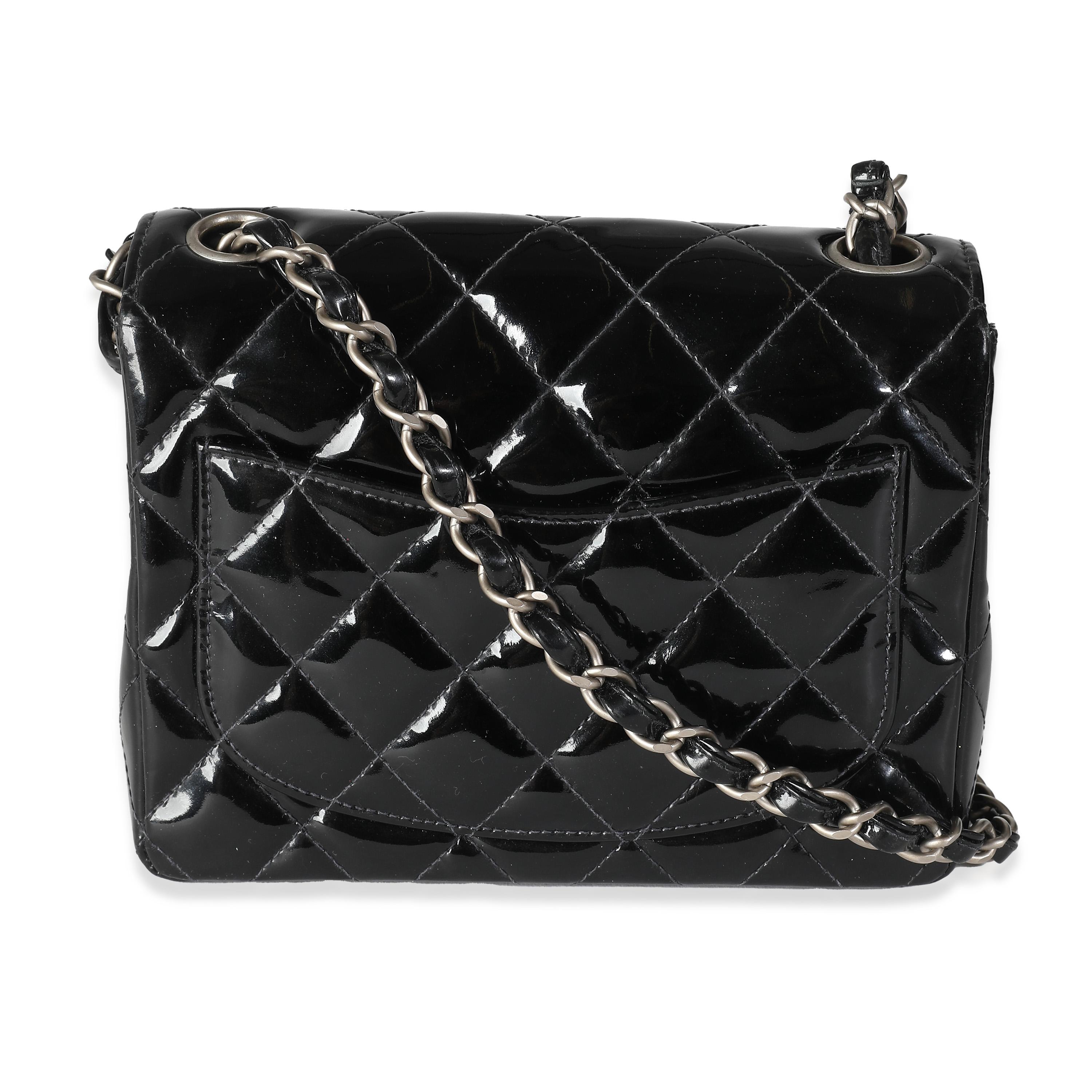 Listing Title: Chanel Vintage Black Quilted Patent Mini Square Flap Bag
SKU: 141266
Condition: Pre-owned 
Condition Description: A timeless classic that never goes out of style, the flap bag from Chanel dates back to 1955 and has seen a number of