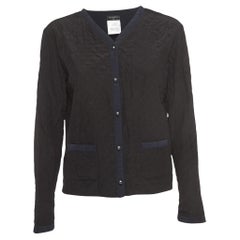 Veste boutonnée en soie matelassée noire vintage Chanel M