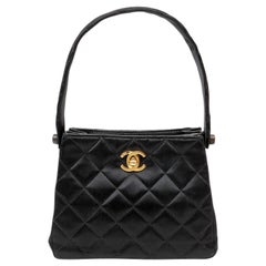 Chanel Vintage Schwarze doppelseitige Abendtasche aus Satin