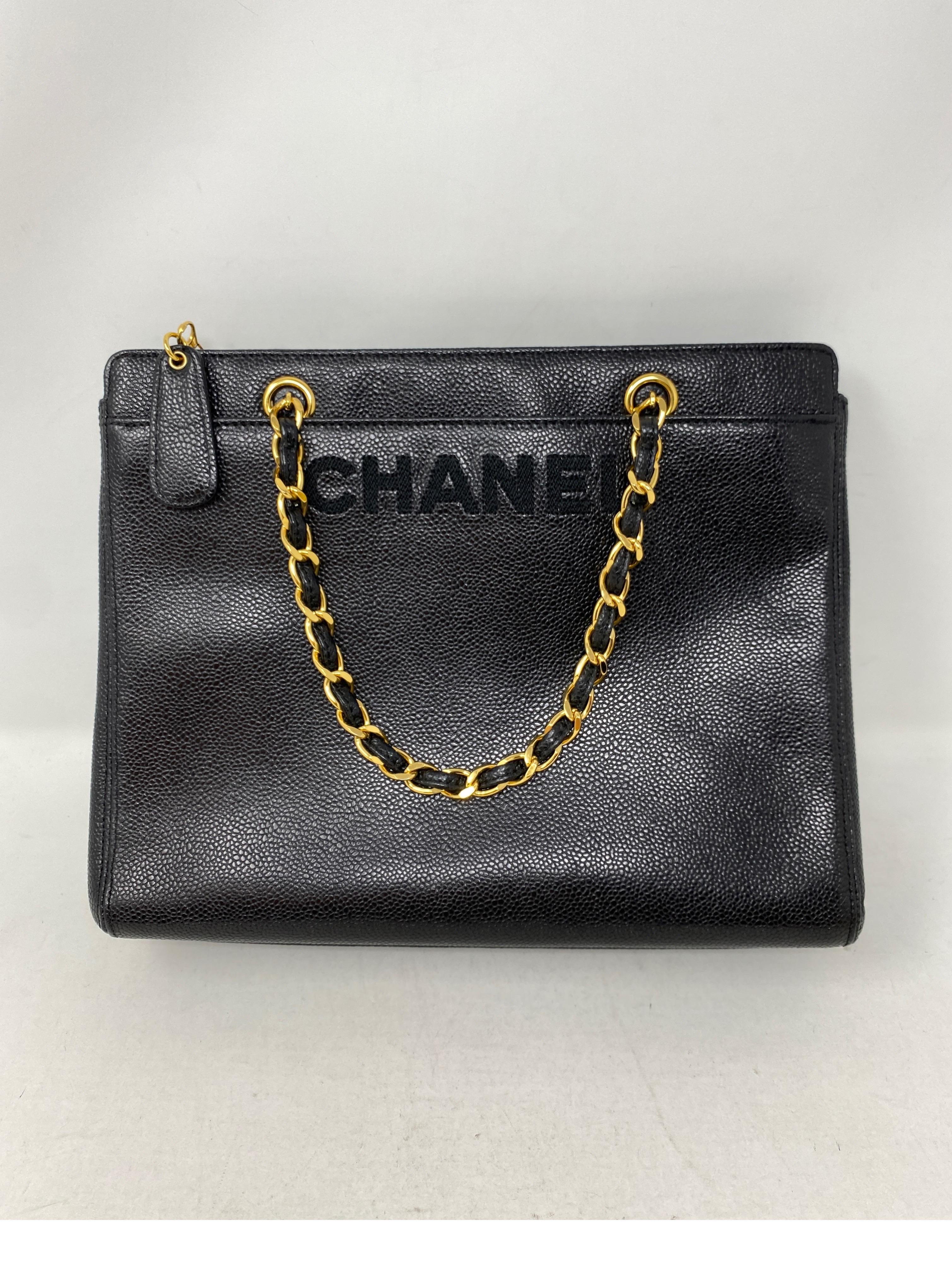 Chanel Vintage Black Tote Bag. Caviar leather. Gold hardware. Excellent condition. Unique style bag. 24 kt gold plating on hardware. Vintage pieces are highly collectible. Rare one. Includes authenticity card. Guaranteed authentic. 