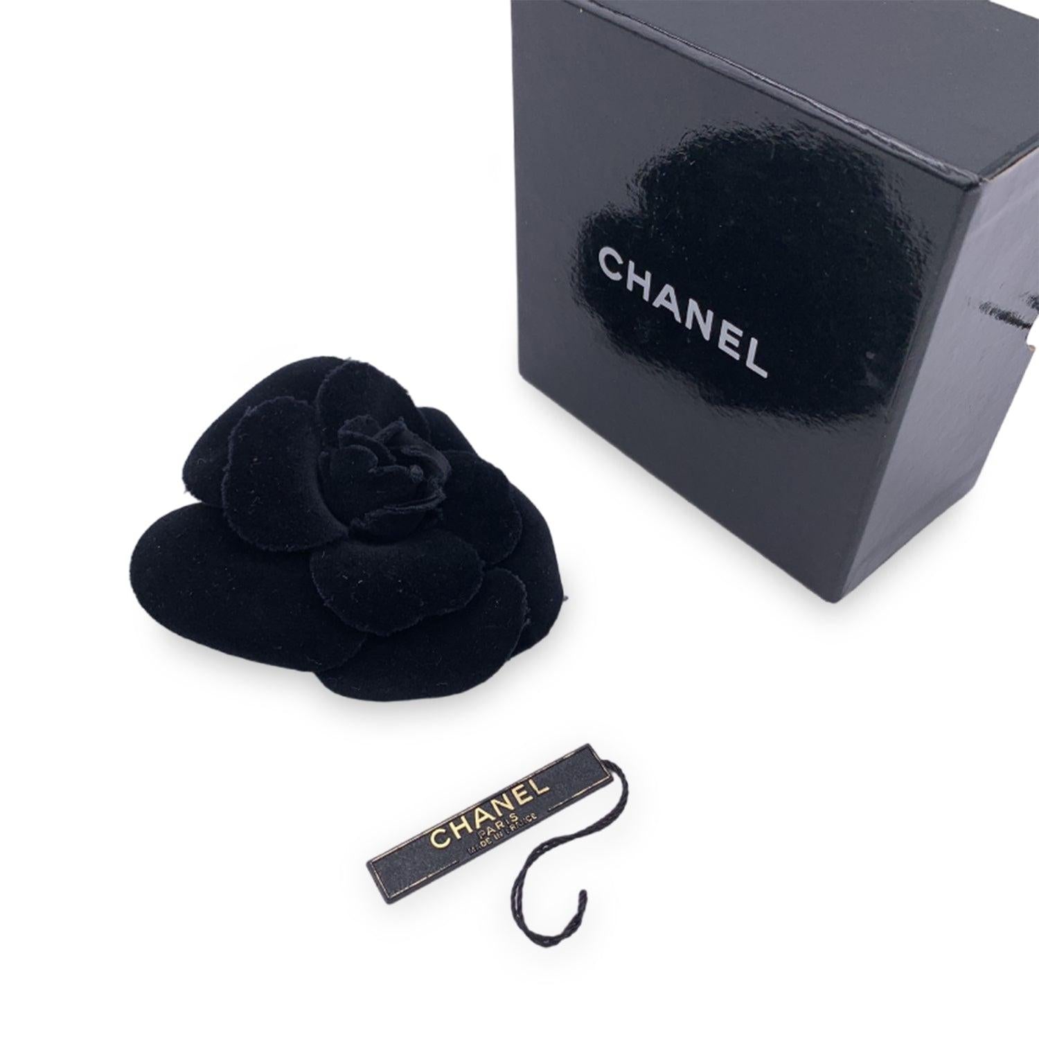 Chanel Vintage Camelia Camellia Flower Pin Brooch. Black velvet petals. Safety pin closure. Max width: 4 inches - 10.2 cm. 'CHANEL - CC - Made in France' oval tab on the back Condition A - EXCELLENT Gently used. Please check the photos carefully and