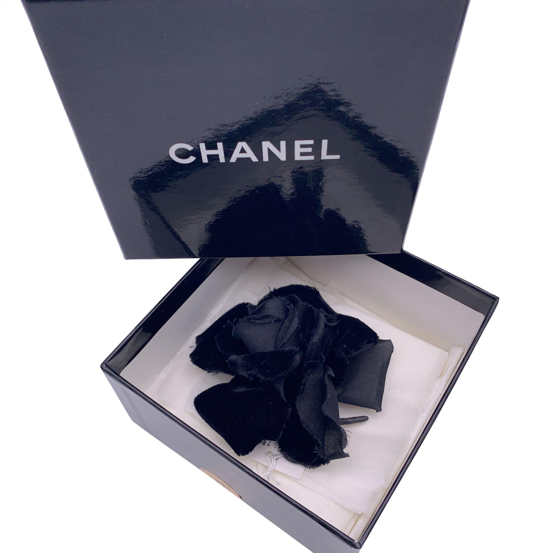 Chanel Vintage Camelia Camellia Flower Pin Brooch. Black velvet petals. Safety pin closure. Max width: 3.5 inches .- 8.9 cm. 'CHANEL - CC - Made in France' oval tab on the back Condition A - EXCELLENT Gently used. Please check the photos carefully