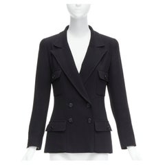 CHANEL Petite veste noire vintage en crêpe de laine avec doublure de soie et boutons CC