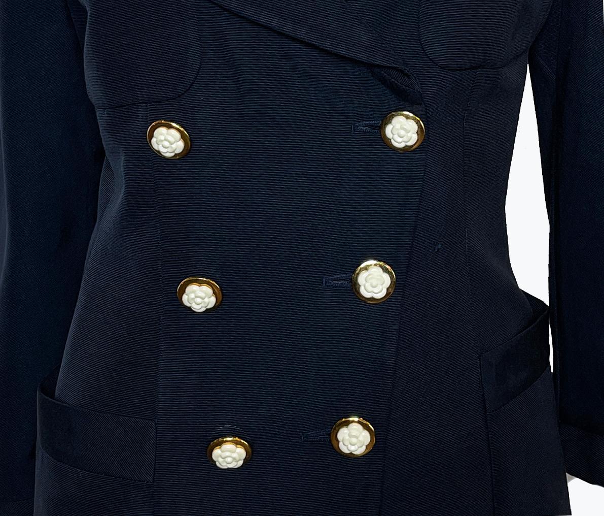 Chanel vintage blue blazer with pointed collar and camellia buttons.
Period: 1990s
Fabric: 56% Cotton, 44% Rayon; Lining 100% Silk
Size –  40 / M-L
Bust: 34″/ 86 cm
Waist: 27″/ 68.5 cm
Shoulder: 13.5″/ 34 cm
Length: 26.5″/ 67 cm
Sleeve: 24.25″/ 61.5