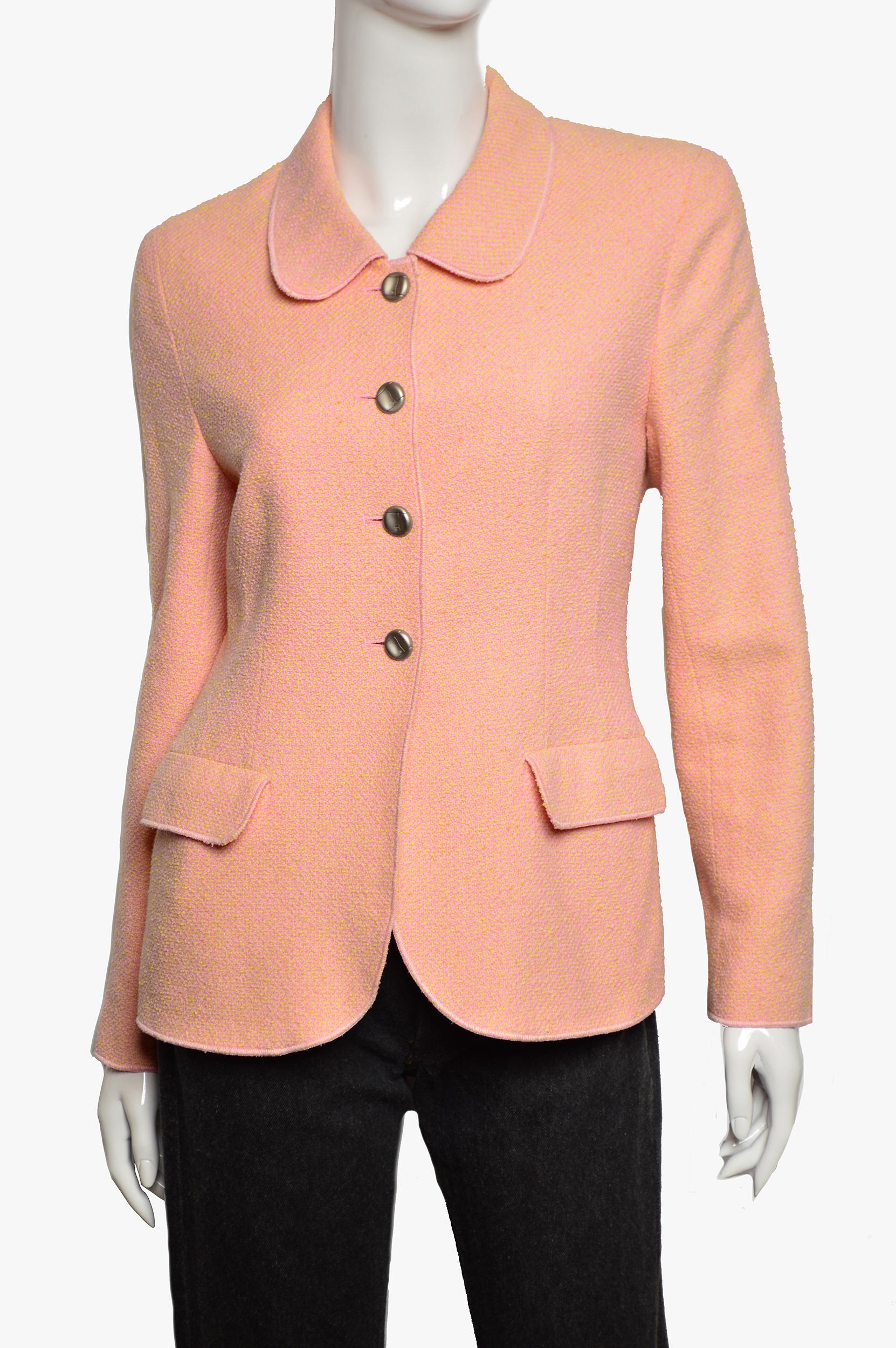 Peach vintage Chanel Boutique tweed jacket with peter pan collar, dual flap pockets at sides, silver-tone interlocking CC hardware and button closures at center front. From the Spring 1998 Collection.

Fabric: 48% Cotton, 37% Wool, 15% Nylon; Lining