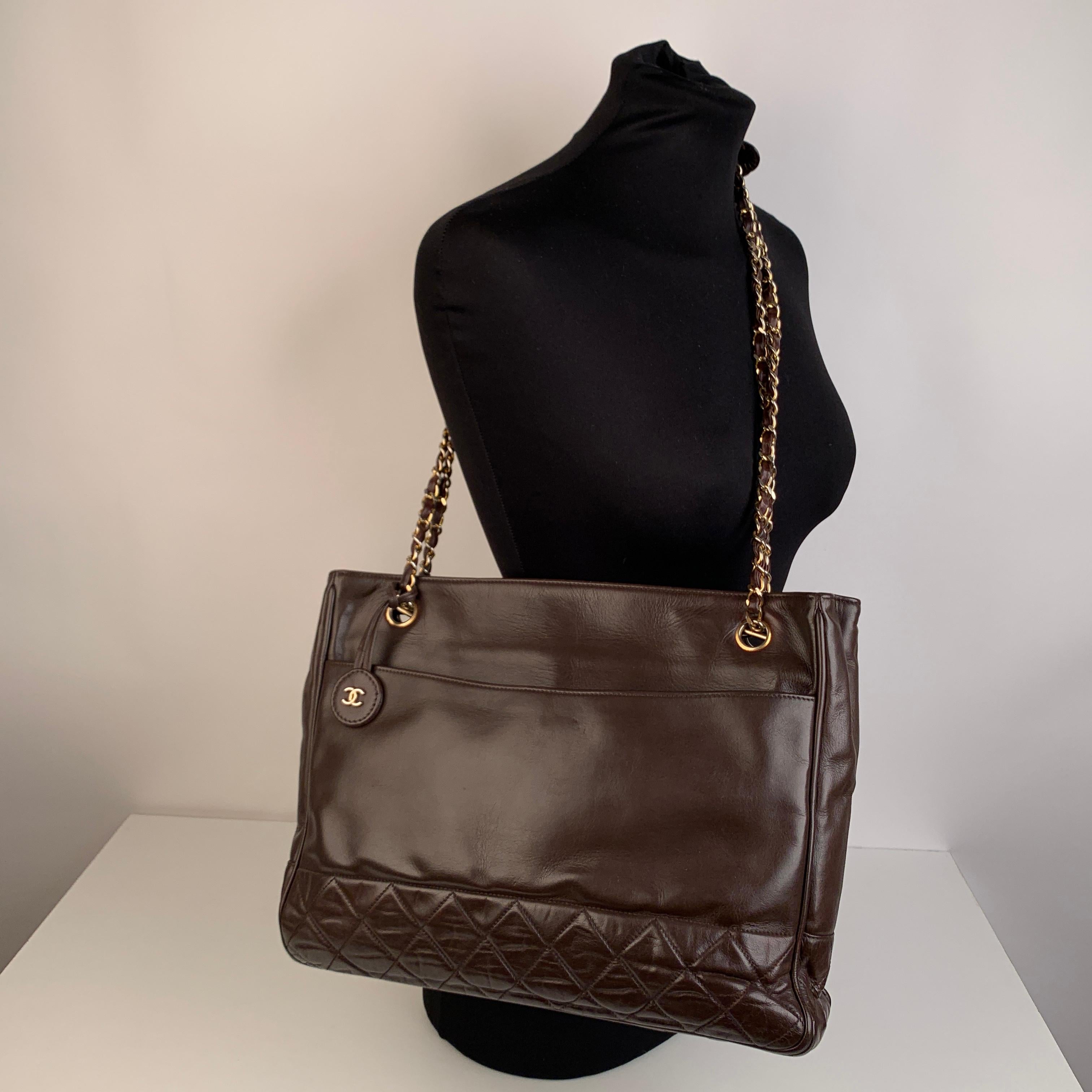 - Beautiful vintage CHANEL bag that appears to be from late 80s - early 90s - Made of brown lambskin leather and partly quilted - Large outer pocket on the front - 2 zipped pockets inside - The main compartment is roomy and securely closes with two