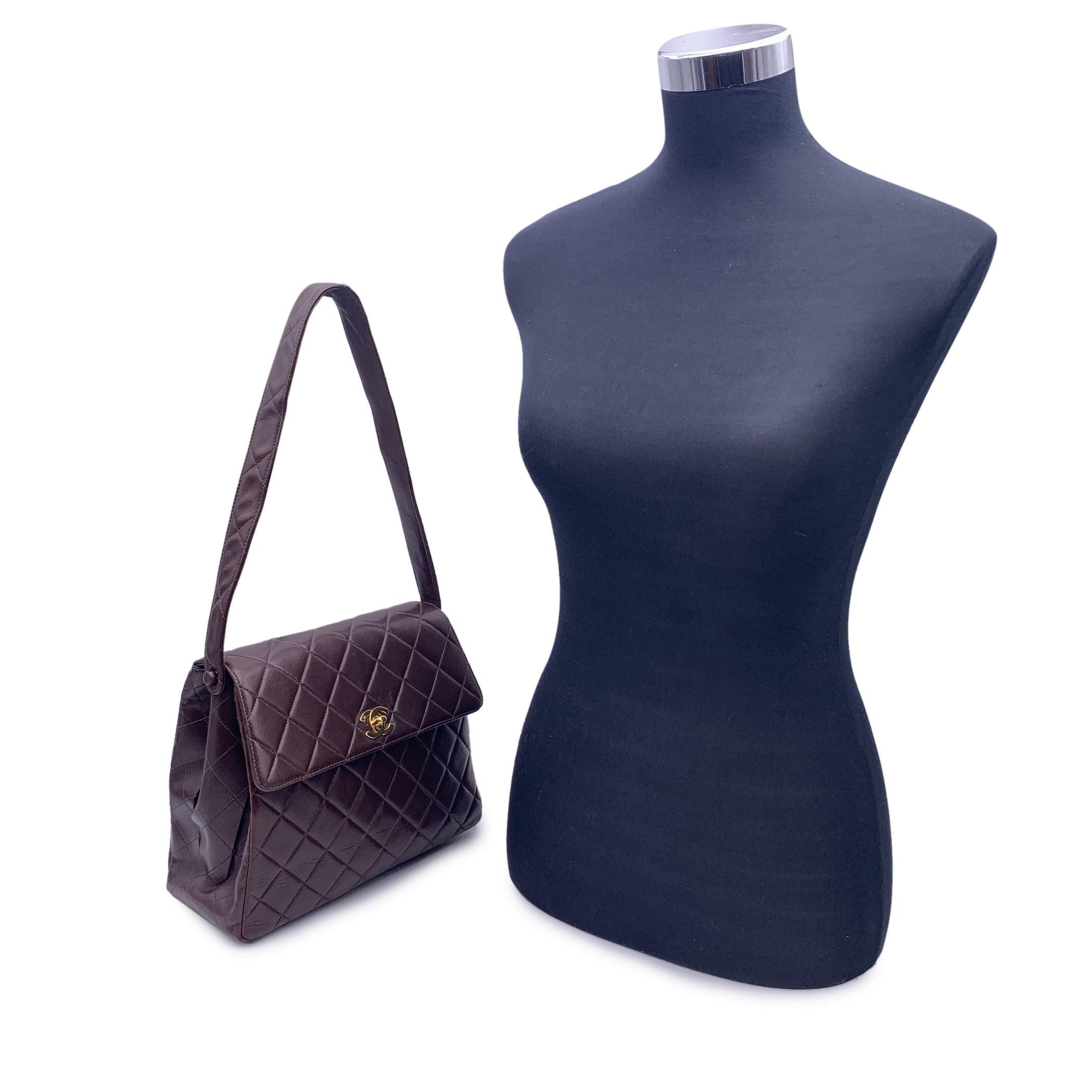 Vintage Chanel shoulder bag in brown quilted leather. Flap with CC turn lock closure. Leather lining. Brown leather lining. 2 main sections inside. 1 side zip pocket inside. Leather quilted shoulder strap. 'CHANEL' and 'Made in france' embossed