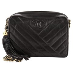 Sold at Auction: Chanel Black and Champagne Chevron Quilted Camera Bag