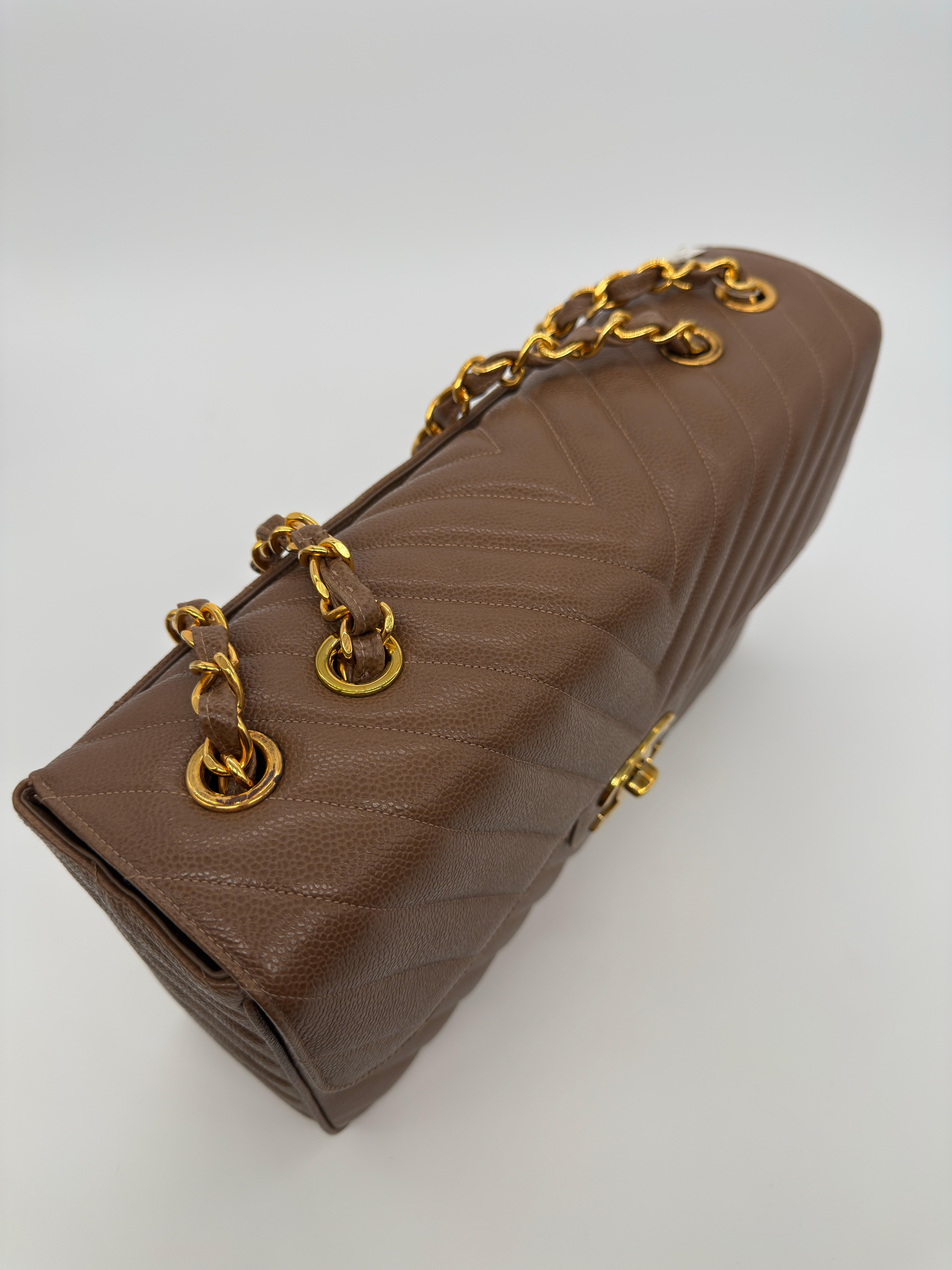 Chanel Vintage Caviar Leather Chevron Maxi Flap Bag For Sale 1