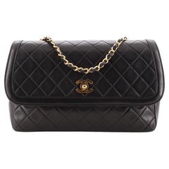 Chanel - Sac à rabat vintage en cuir d
agneau matelassé avec chaîne CC - Large